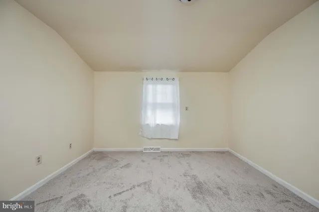 a bathroom with a sink a mirror and a shower