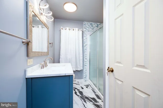 a view of a room with wooden walls