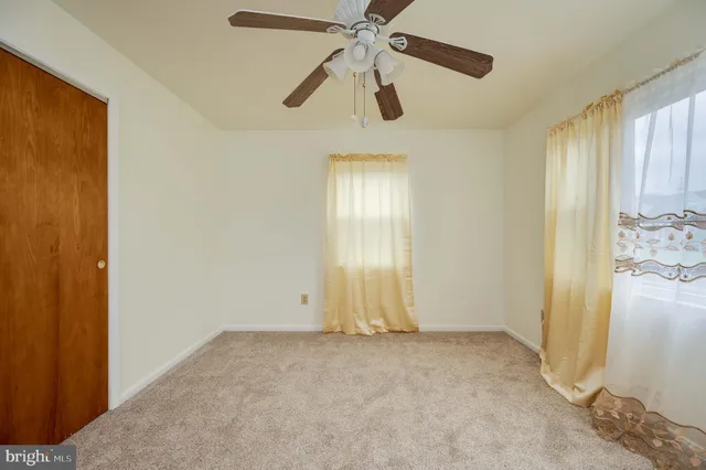 a view of a swimming pool with an outdoor seating