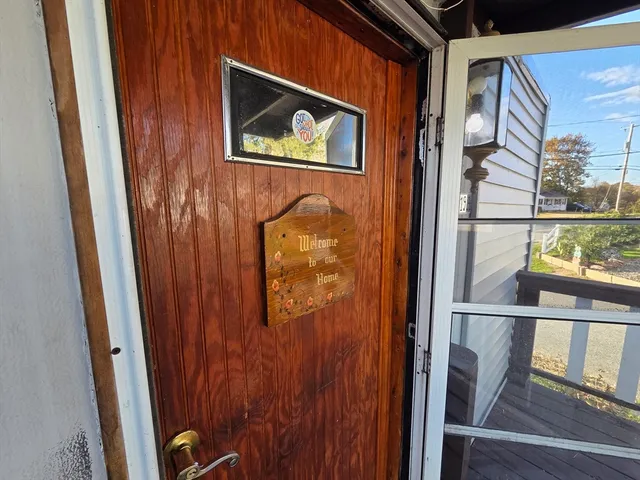 a view of balcony with wooden floor