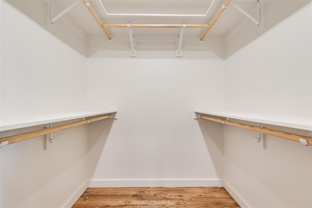 3106 Sharpview Lane Dallas, TX 75228 - Photo 25 of 33 a view of walk in closet with empty racks