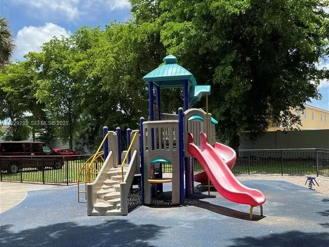 a bench is sitting in the middle of a park