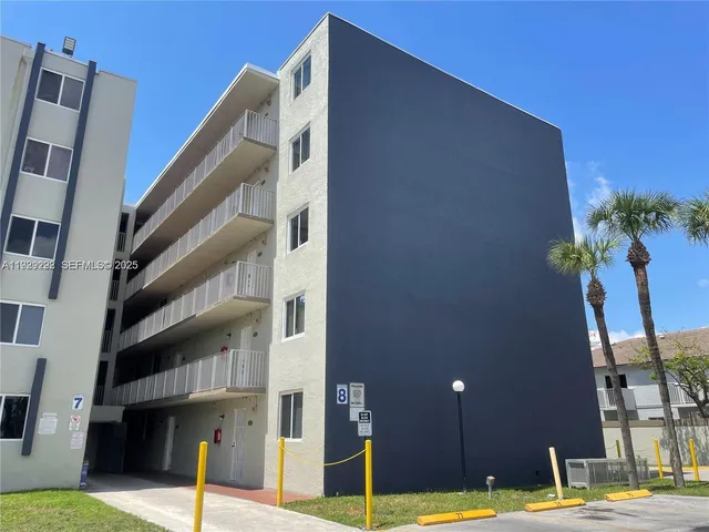 a front view of a building with street view