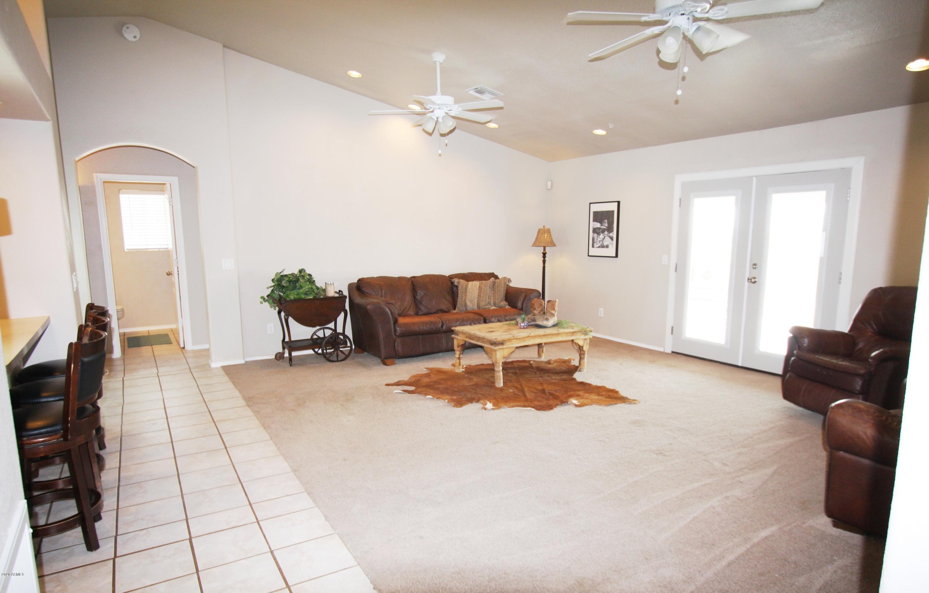 94 North Mountain View Road Apache Junction, AZ 85119 - Photo 5 of 27 LivingOwnerExit