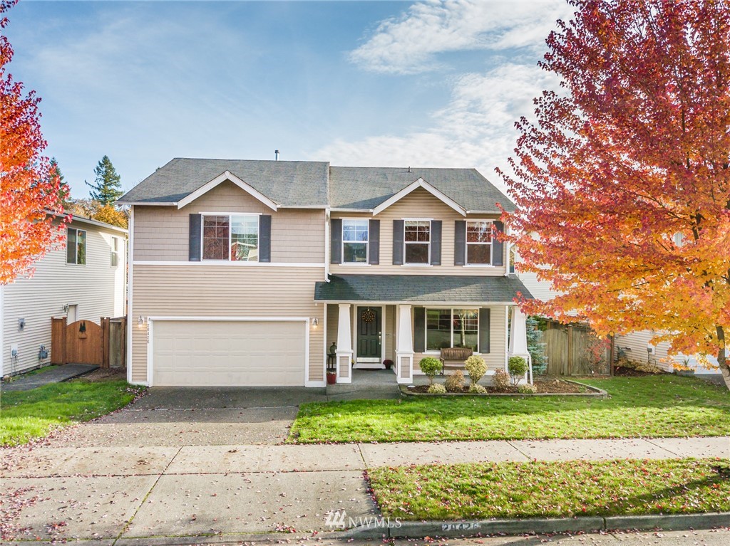 20426 Corbridge Road Southeast Monroe, WA 98272 - Photo 1 of 23 a front view of a house with a yard