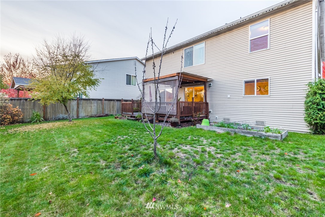 20426 Corbridge Road Southeast Monroe, WA 98272 - Photo 21 of 23 a view of a house with a backyard
