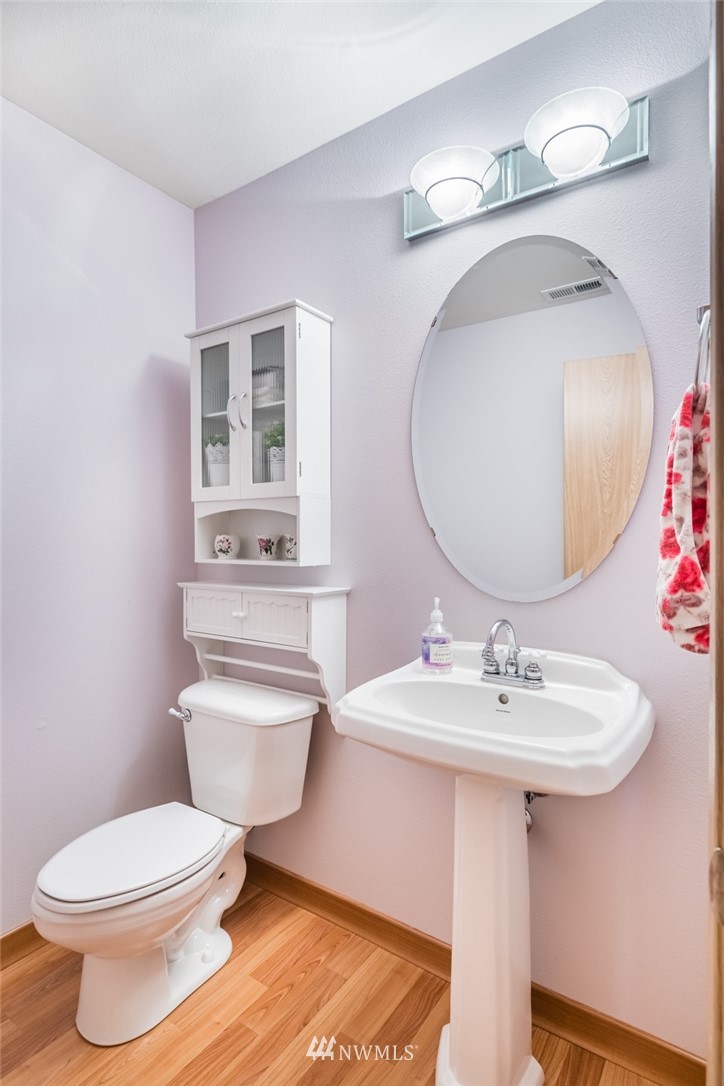 20426 Corbridge Road Southeast Monroe, WA 98272 - Photo 5 of 23 a bathroom with a sink toilet and mirror