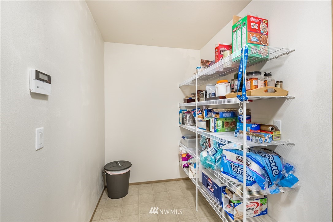 20426 Corbridge Road Southeast Monroe, WA 98272 - Photo 9 of 23 a room with toys and a shelf