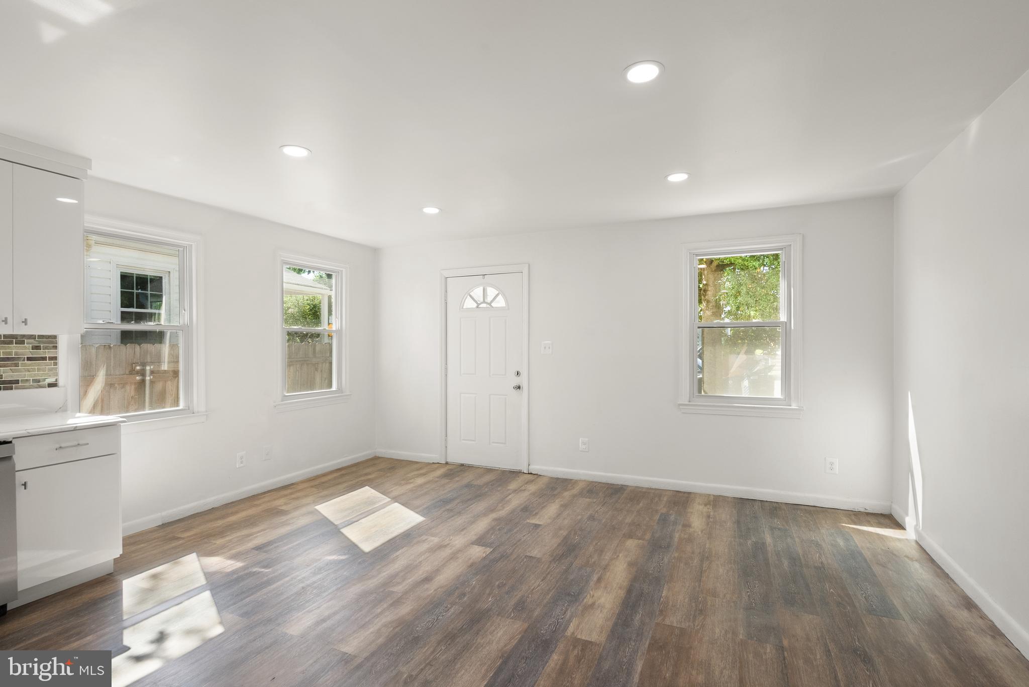 28 East Reed Avenue Alexandria, VA 22305 - Photo 15 of 33 a view of empty room with wooden floor and fan