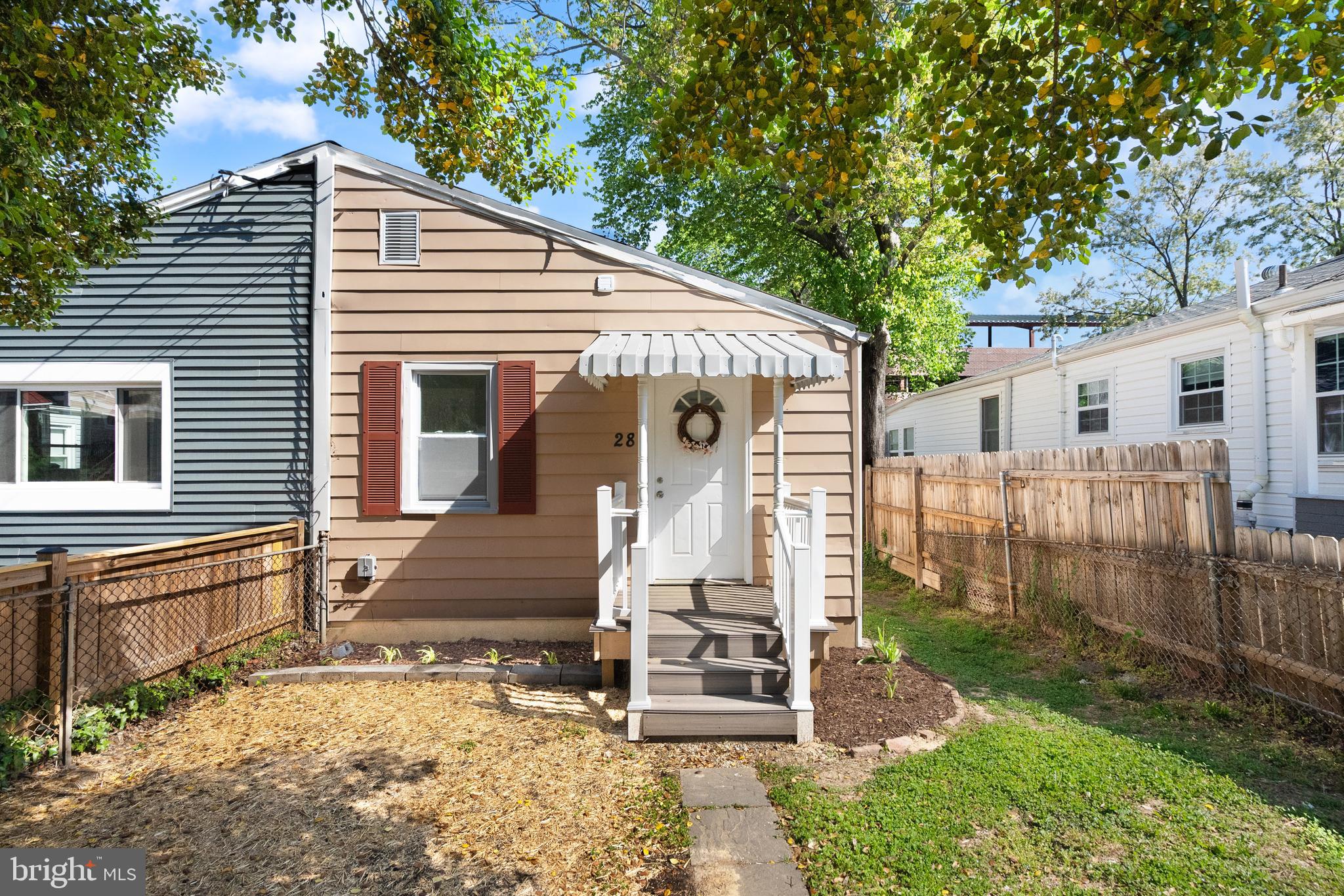 28 East Reed Avenue Alexandria, VA 22305 - Photo 2 of 33 a front view of house with a garden