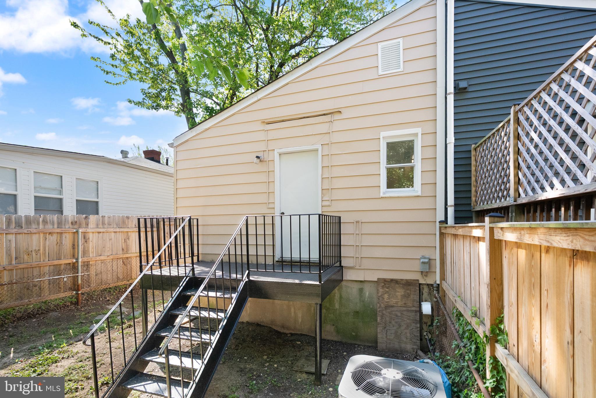 28 East Reed Avenue Alexandria, VA 22305 - Photo 28 of 33 a view of backyard with outdoor seating and stairs