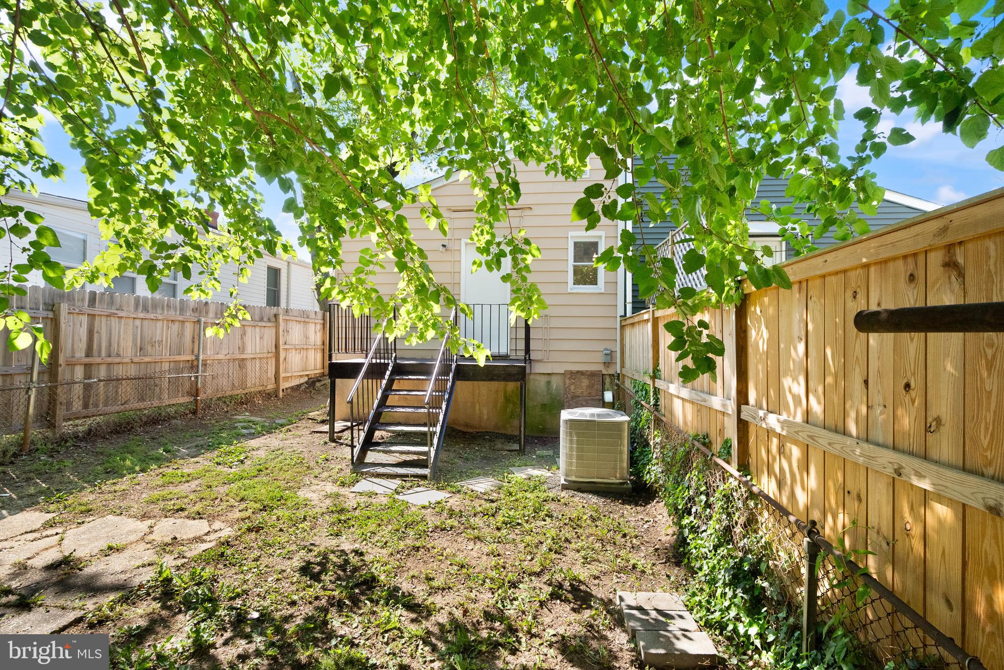 28 East Reed Avenue Alexandria, VA 22305 - Photo 32 of 33 a view of a backyard with a tree