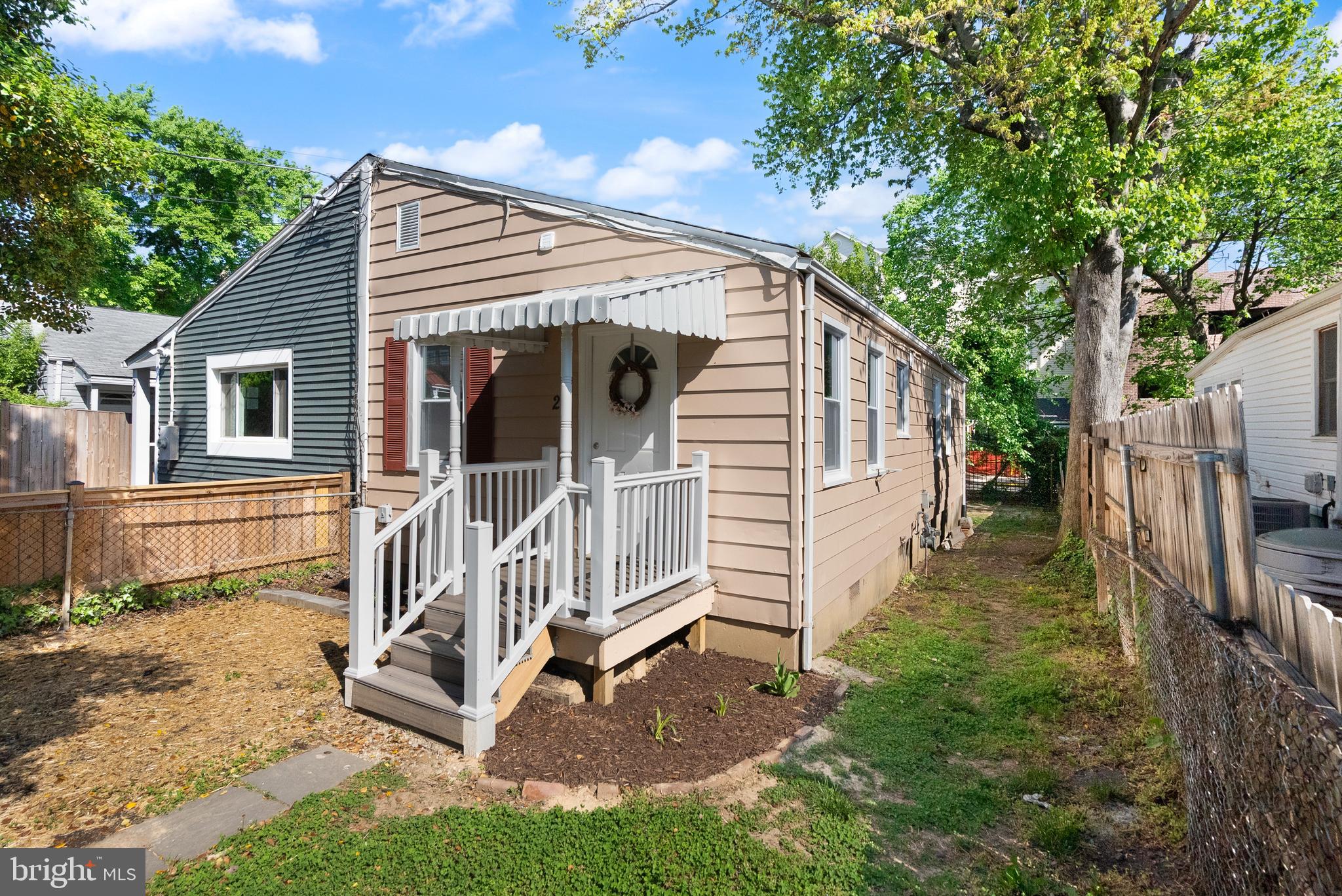 28 East Reed Avenue Alexandria, VA 22305 - Photo 6 of 33 a view of a house with a yard