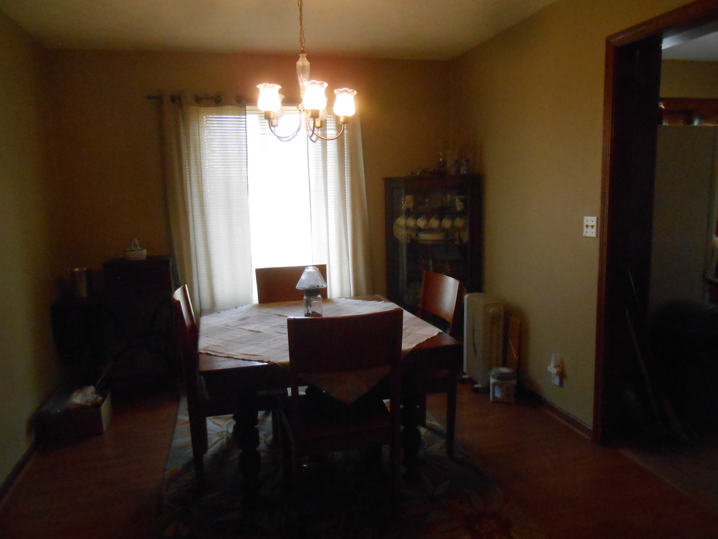 2916 East 29th Road Seneca, IL 61360 - Photo 8 of 14 a view of a dining room with furniture and chandelier