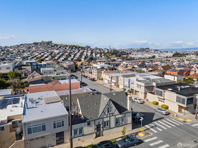 an aerial view of mountain with trees