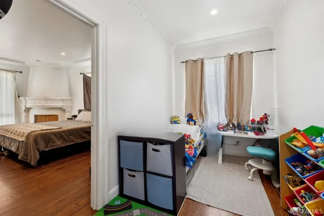 a bedroom with a bed and a walk in closet