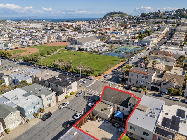 an aerial view of a city with lots of residential buildings