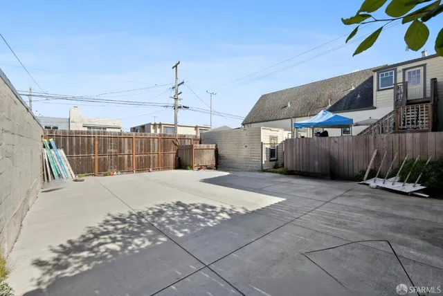 a view of a terrace with seating area