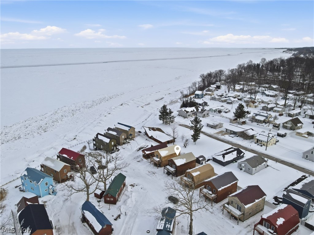 5919 Lake Road West, Unit 32 Ashtabula, OH 44004 - Photo 22 of 23 Aerial view of residential area featuring a large body of water