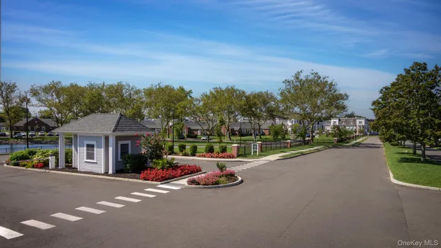 a view of a street with houses on both side