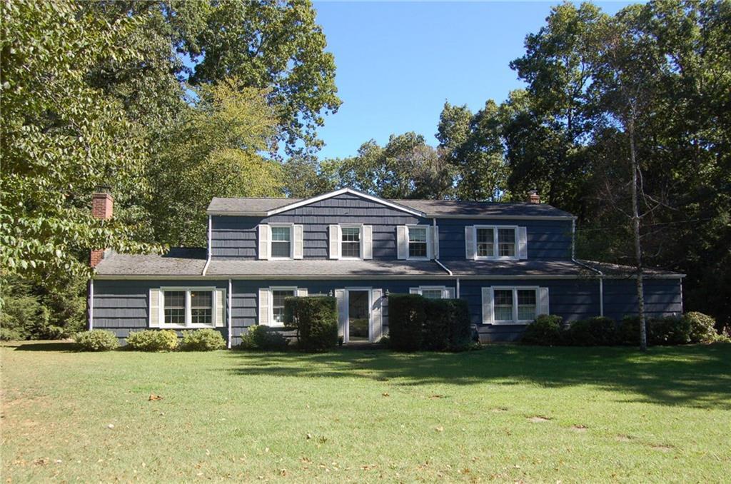140 Gary Road Stamford, CT 06903 - Photo 1 of 1 a front view of a house with a garden