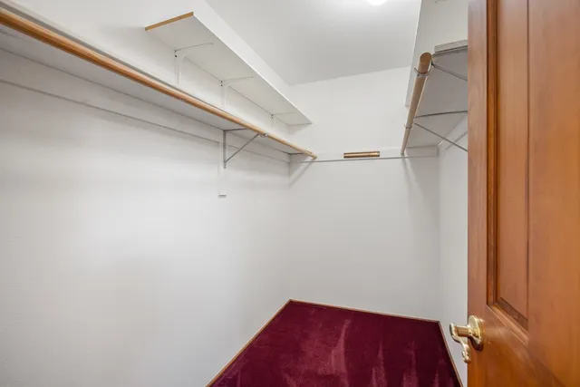 a view of a room with racks on the wall