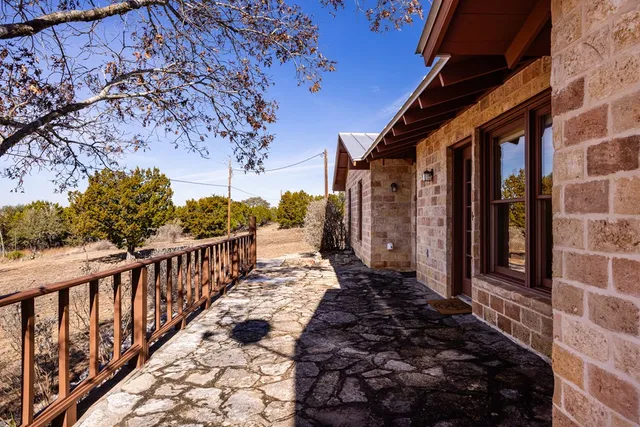 a view of a pathway with a balcony