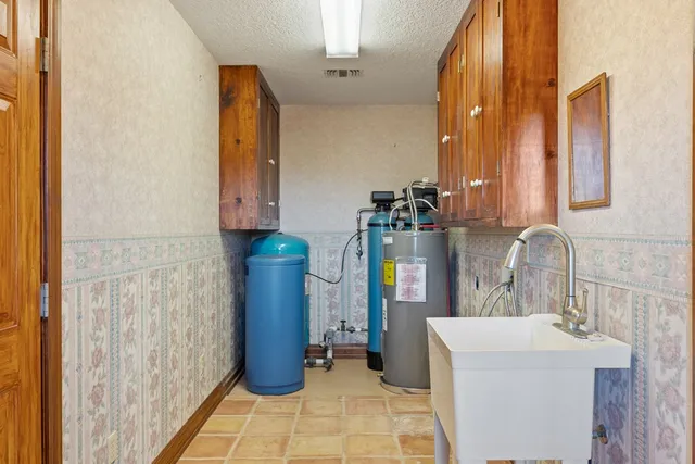 a bathroom with a mirror and shower