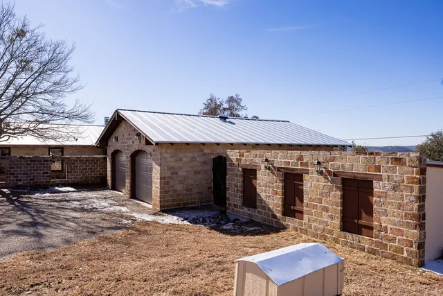 a front view of a house with yard