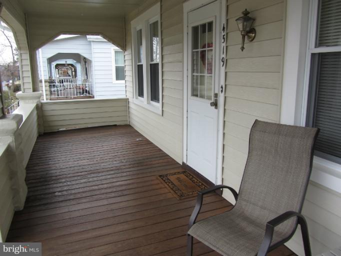 4519 Raspe Avenue Baltimore, MD 21206 - Photo 20 of 30 Covered Front Porch with Wood Decking