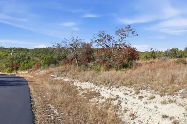 a view of mountain with lake view