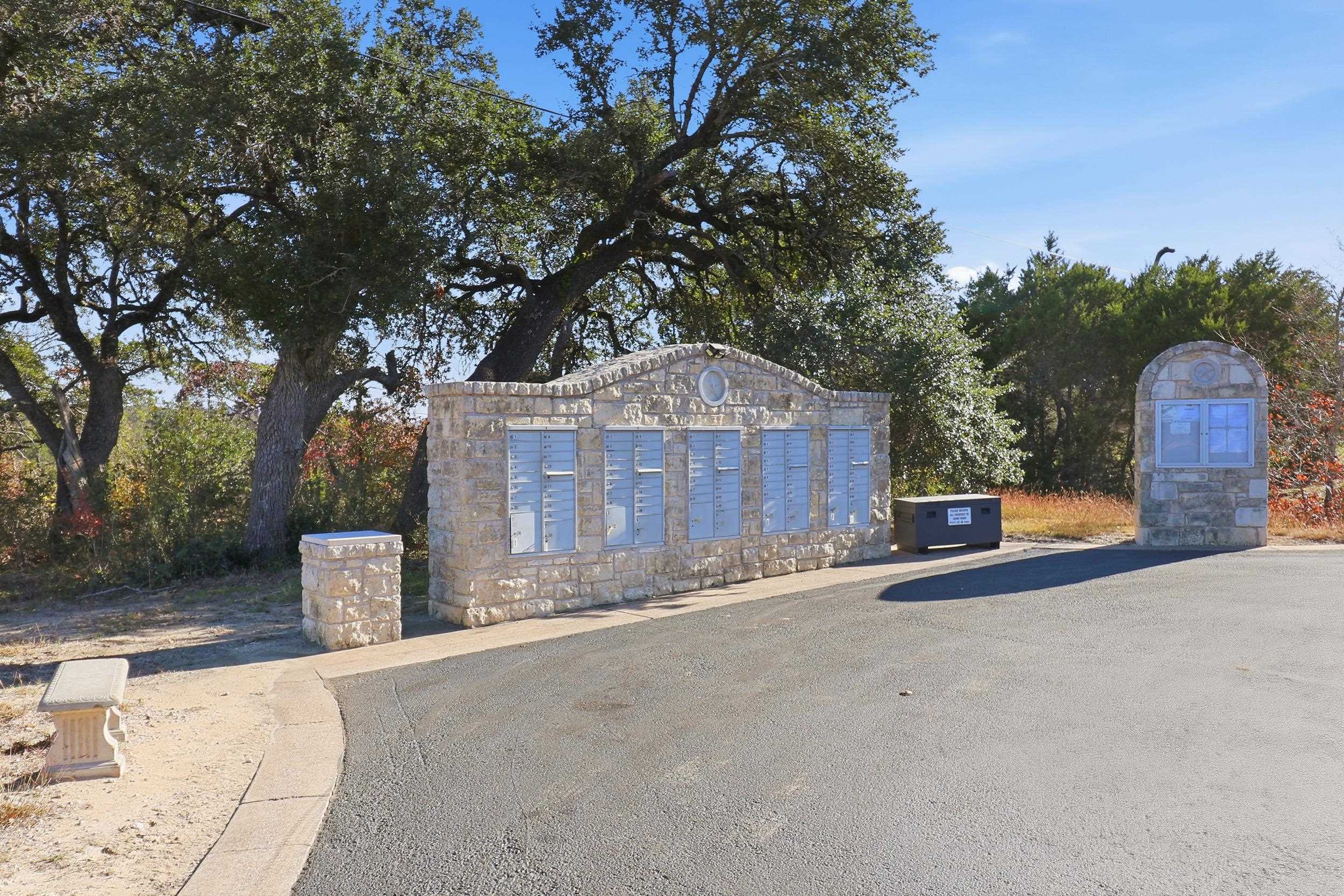 29910 Montana Ridge Pass Marble Falls, TX 78654 - Photo 21 of 24 a large tree in front of a house