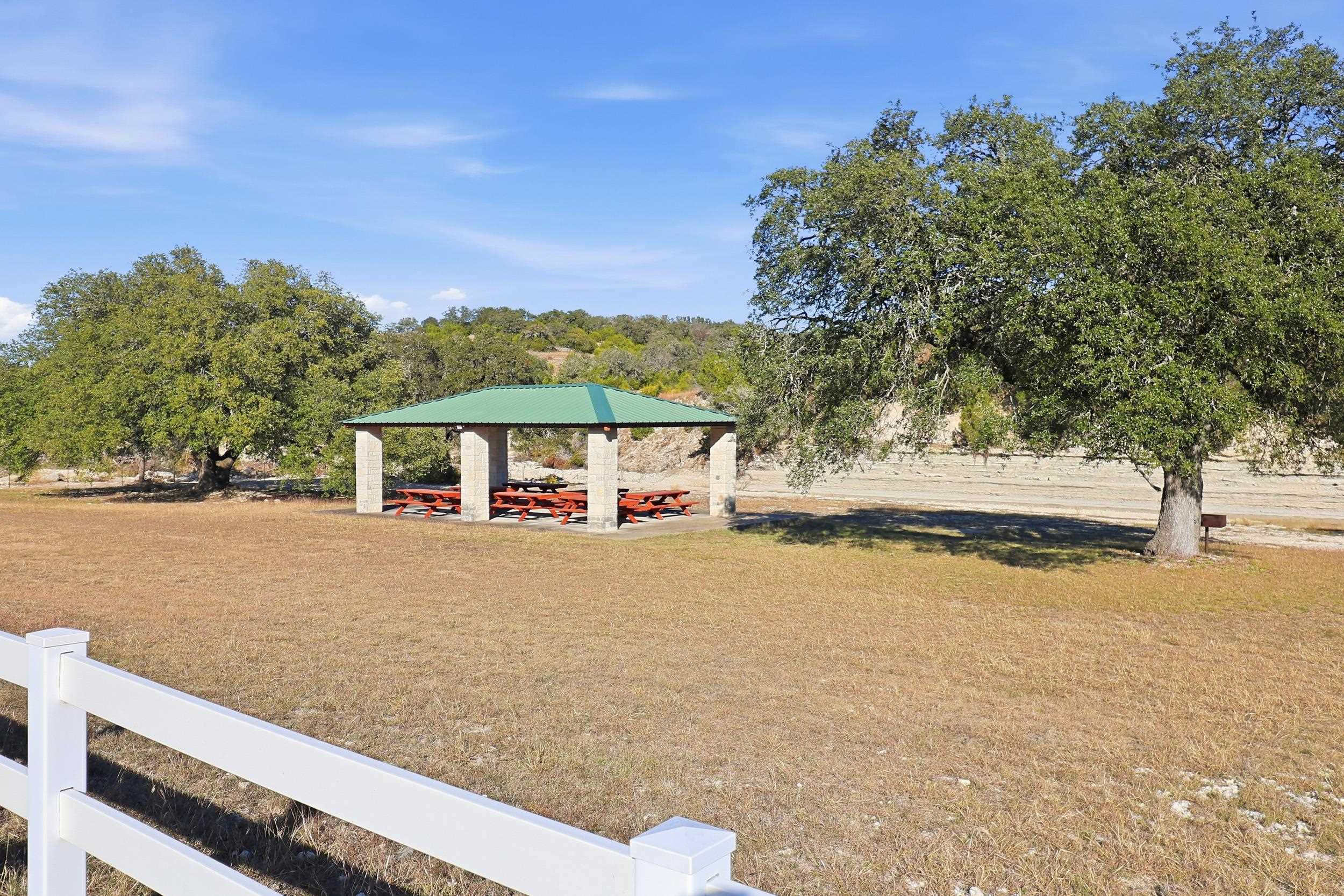 29910 Montana Ridge Pass Marble Falls, TX 78654 - Photo 23 of 24 a view of a house with a yard