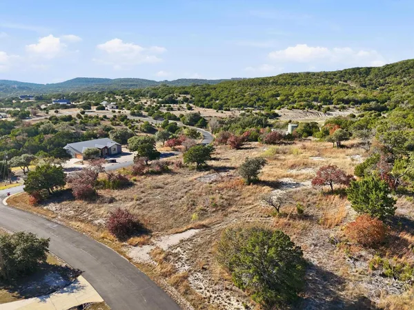 a view of a city with mountain