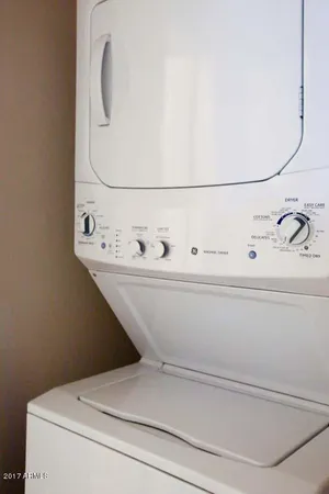 a room with a cabinet and mirror