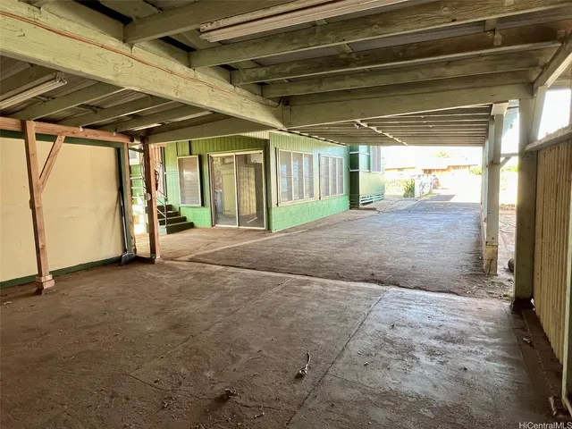 a white toilet sitting next to a sink