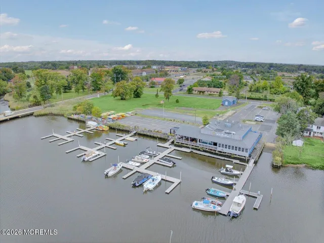an aerial view of a city and lake view