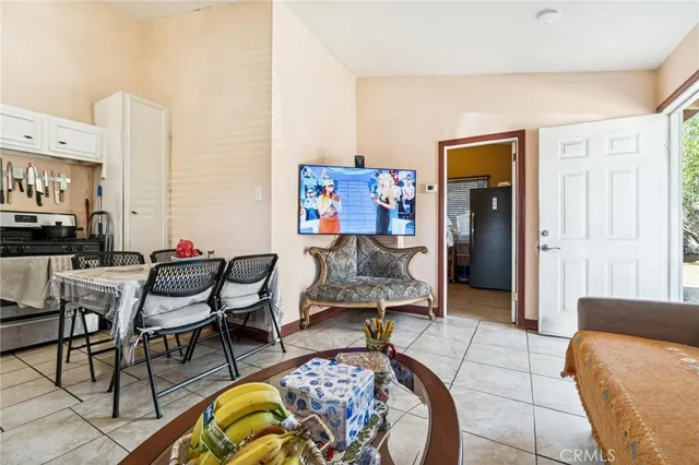 a living room with furniture and a rug