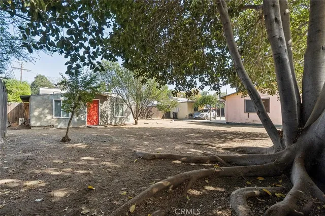 a house with trees in front of it