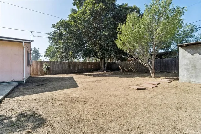 a view of a backyard of a house