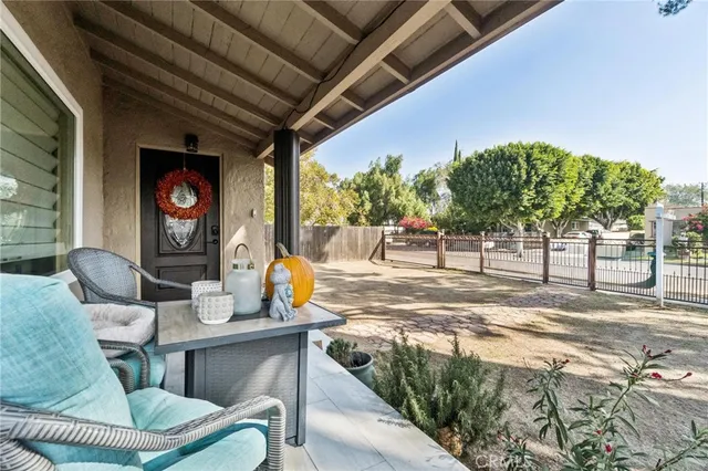 a view of a chairs and tables in patio