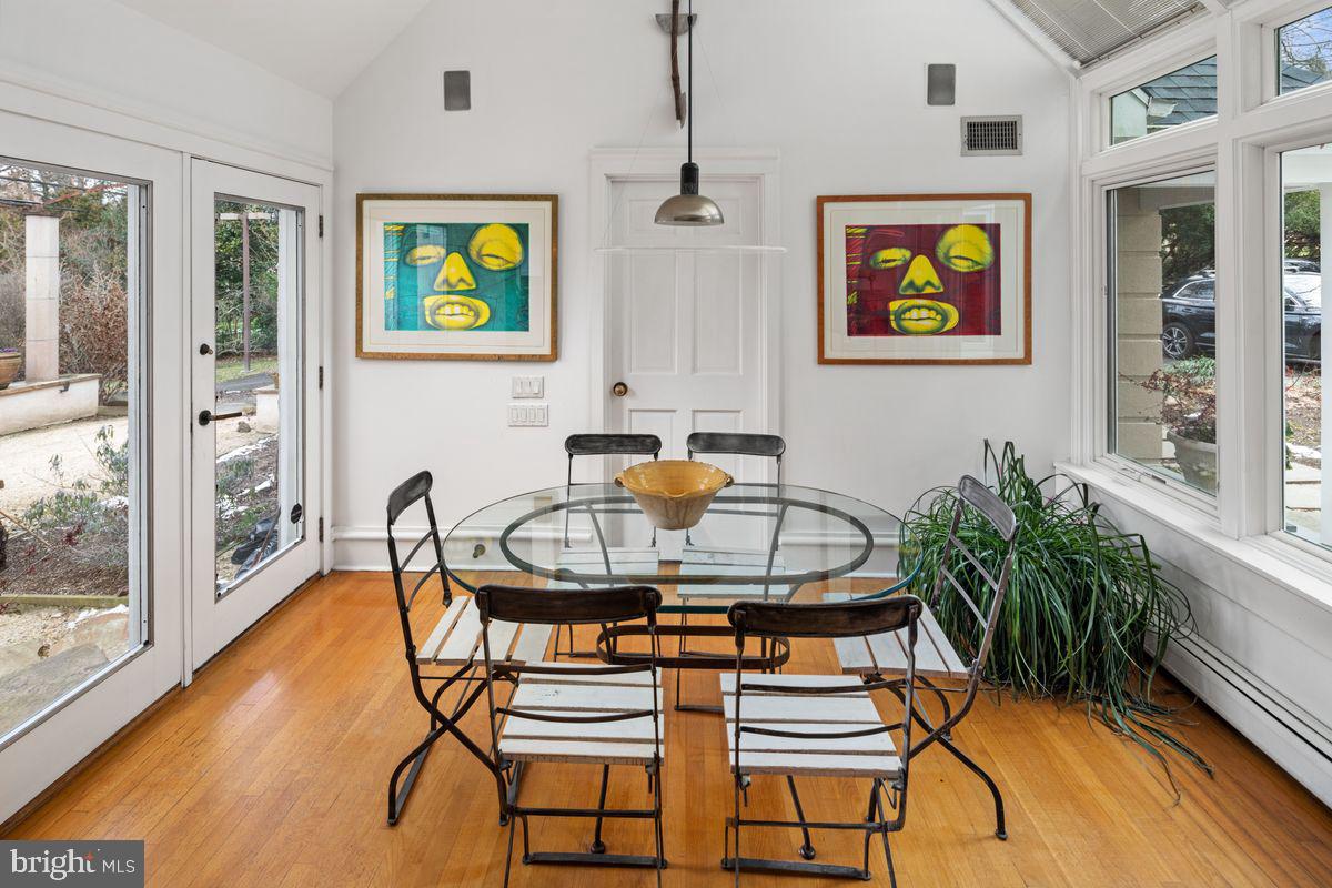 145 East Bells Mill Road Philadelphia, PA 19118 - Photo 11 of 38 a dining room with furniture and wooden floor