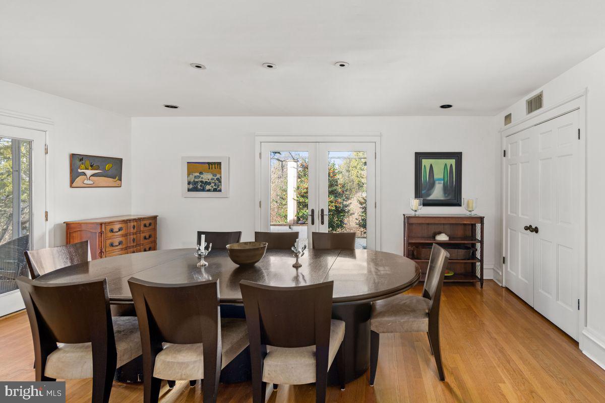 145 East Bells Mill Road Philadelphia, PA 19118 - Photo 15 of 38 a view of a dining room with furniture and wooden floor