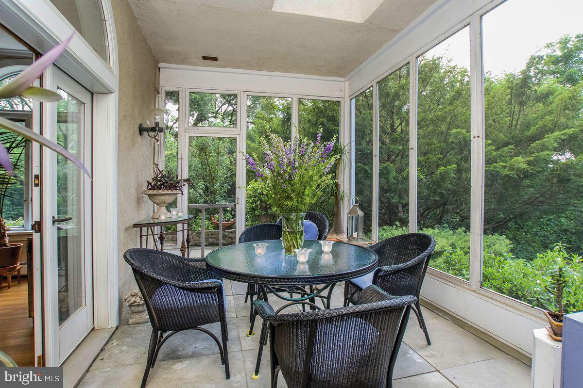 145 East Bells Mill Road Philadelphia, PA 19118 - Photo 16 of 38 a view of a outdoor seating area