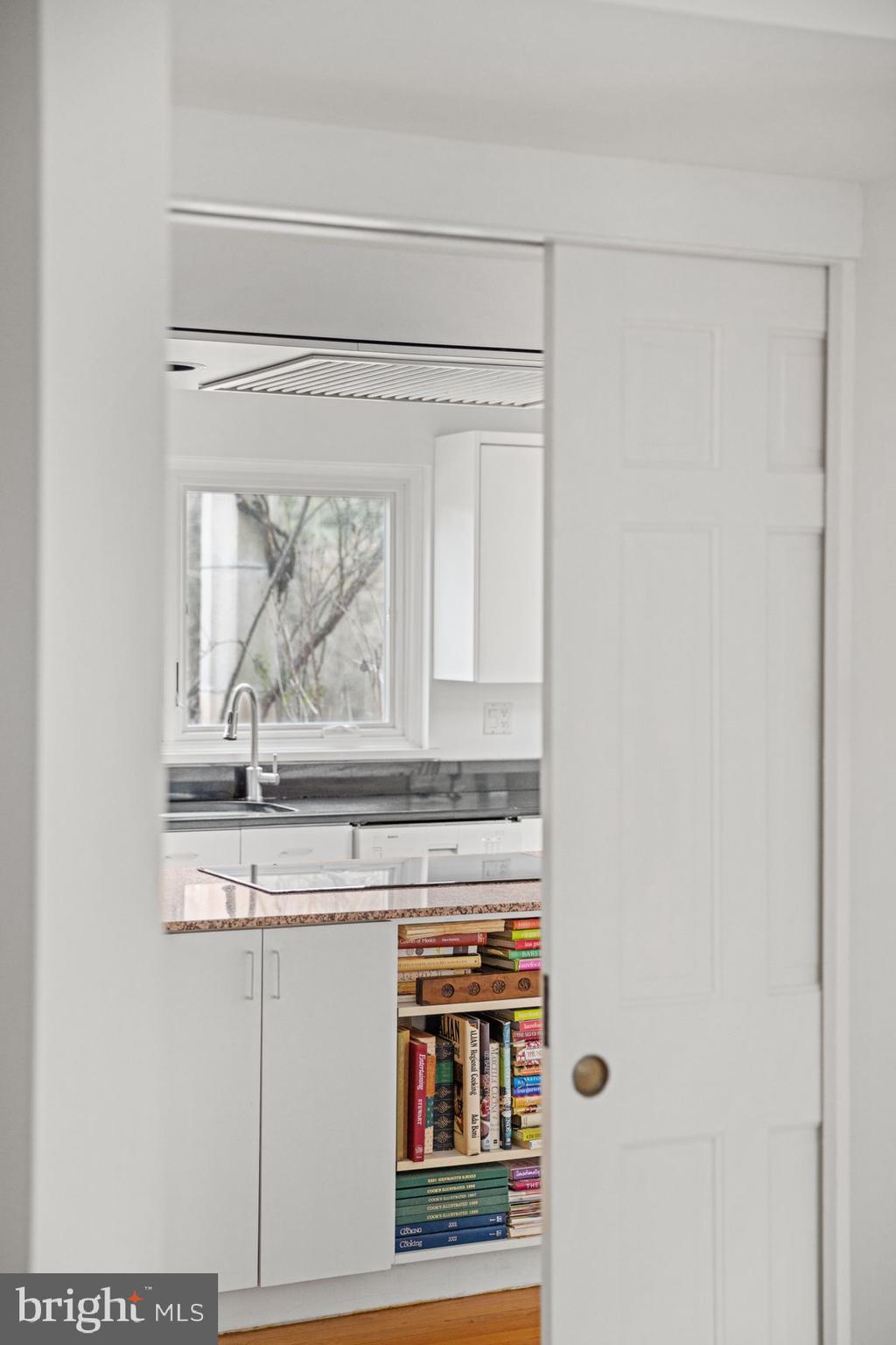 145 East Bells Mill Road Philadelphia, PA 19118 - Photo 7 of 38 a view of a kitchen from a window
