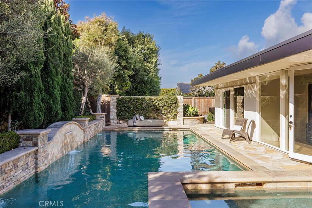 147 Monarch Bay Drive Dana Point, CA 92629 - Photo 12 of 18 a swimming pool with outdoor seating and yard