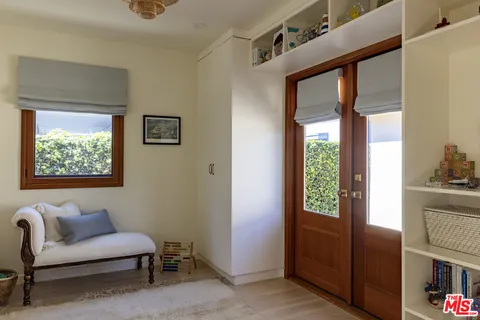 a kitchen with stainless steel appliances a sink and a window