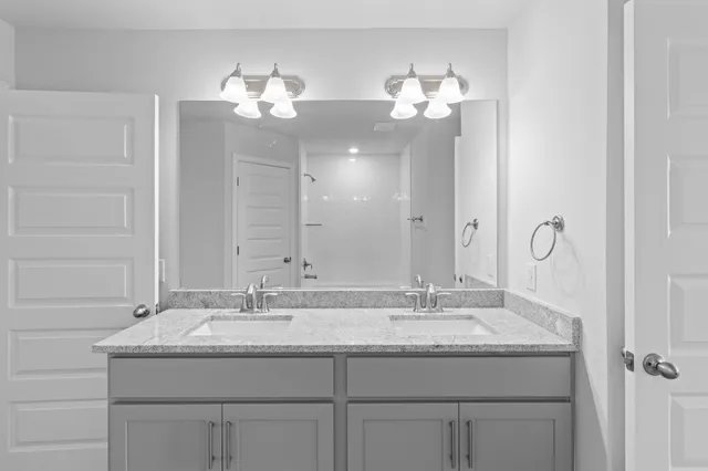 a bathroom with a bathtub a toilet and a shower