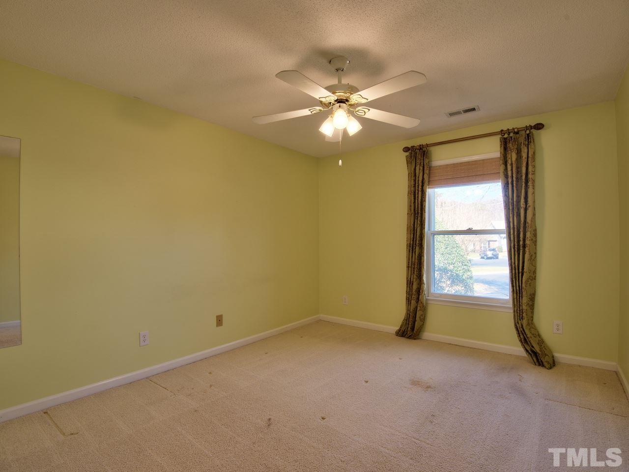 2740 Cottage Circle Raleigh, NC 27613 - Photo 17 of 25 an empty room with a window