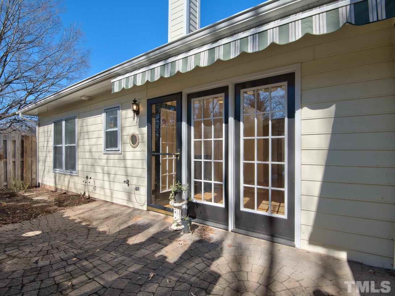 2740 Cottage Circle Raleigh, NC 27613 - Photo 20 of 25 a view of a house with a large window
